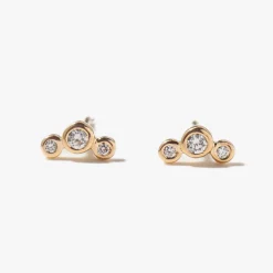 Three Small Graduated Diamond Bezel Studs