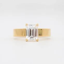 Emerald Cut Four-Prong Temple Solitaire