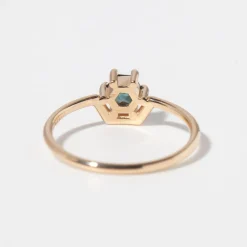 Small Hexagon Cut Teal Sapphire Nestled Ring